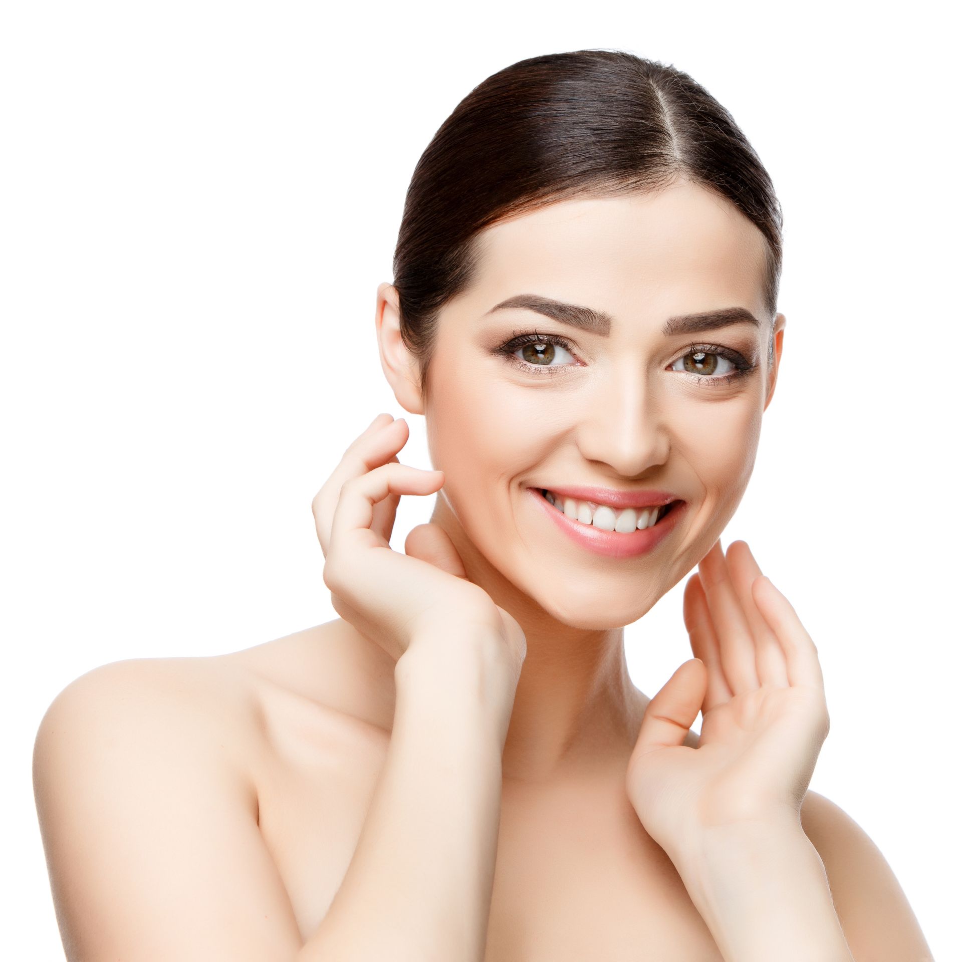 A woman is smiling and touching her face with her hands.