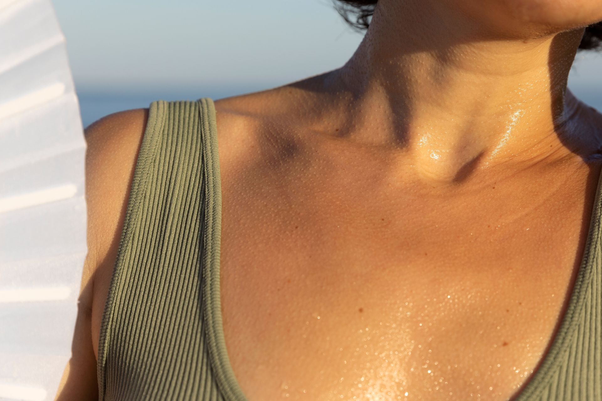 A close up of a woman 's neck and chest.