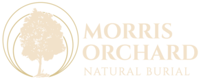 The morris orchard natural burial logo shows a tree in a circle.