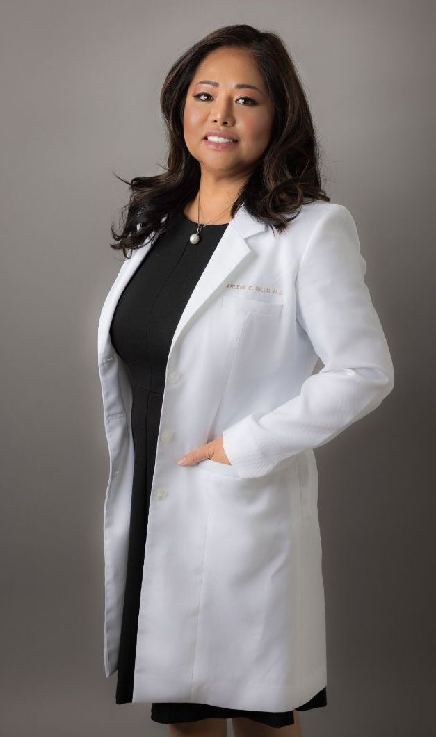 headshot of Dr. Arlene Rillo in white doctor coat