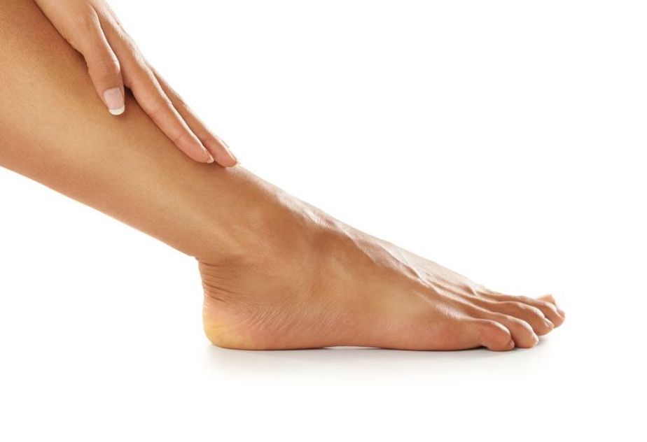 closeup of woman's foot on white background