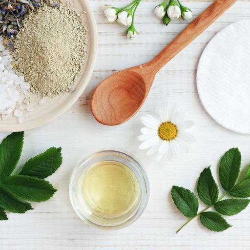 A Wooden Spoon And A Bowl Of Oil On A Table – Terrigal, NSW - Anjule Beauty Therapy