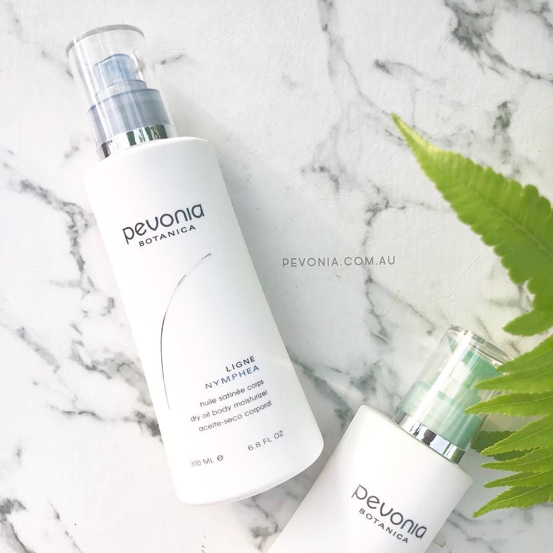 Two Bottles Of Pevonia Botanica Are On A Marble Surface – Terrigal, NSW - Anjule Beauty Therapy