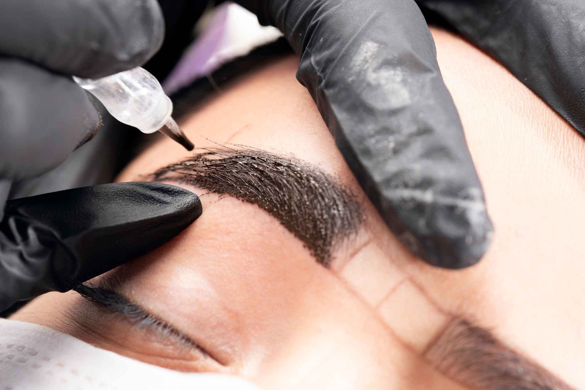 A Woman Is Getting A Permanent Makeup Tattoo On Her Eyebrows – Terrigal, NSW - Anjule Beauty Therapy