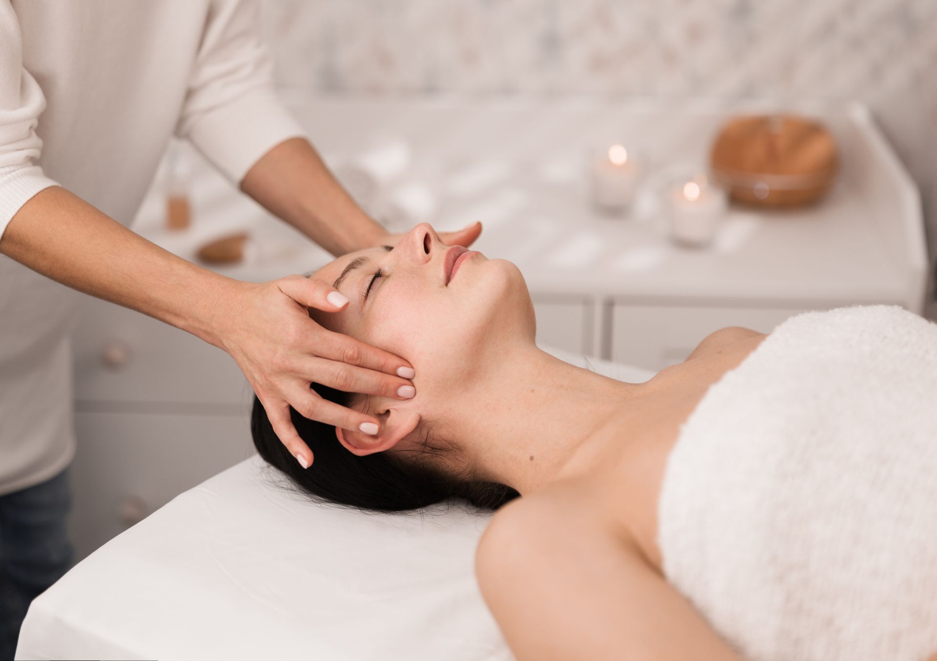 A Woman Is Getting A Head Massage In A Spa – Terrigal, NSW - Anjule Beauty Therapy