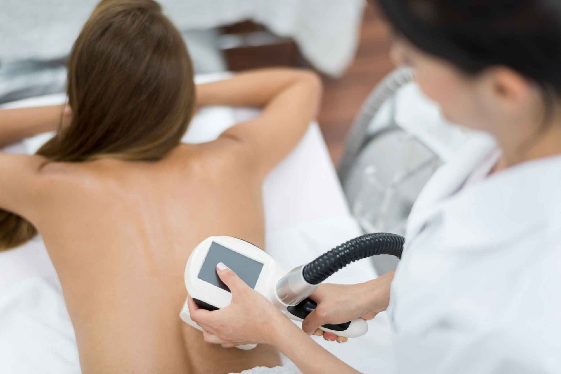 Woman At The Spa Getting Laser Therapy To Remove Localized Fat In Her Body – Terrigal, NSW - Anjule Beauty Therapy