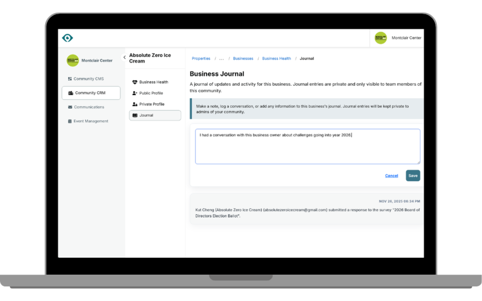 Green hand holding globe with two hearts.