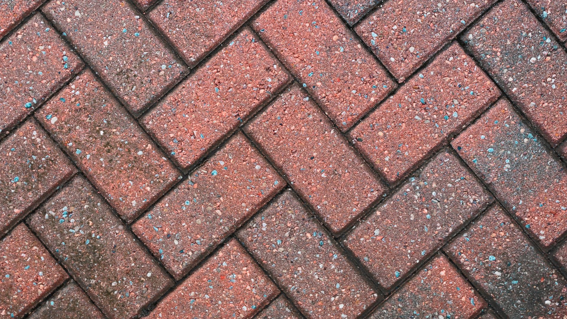 Brindle red block paving close shot image on a driveway.