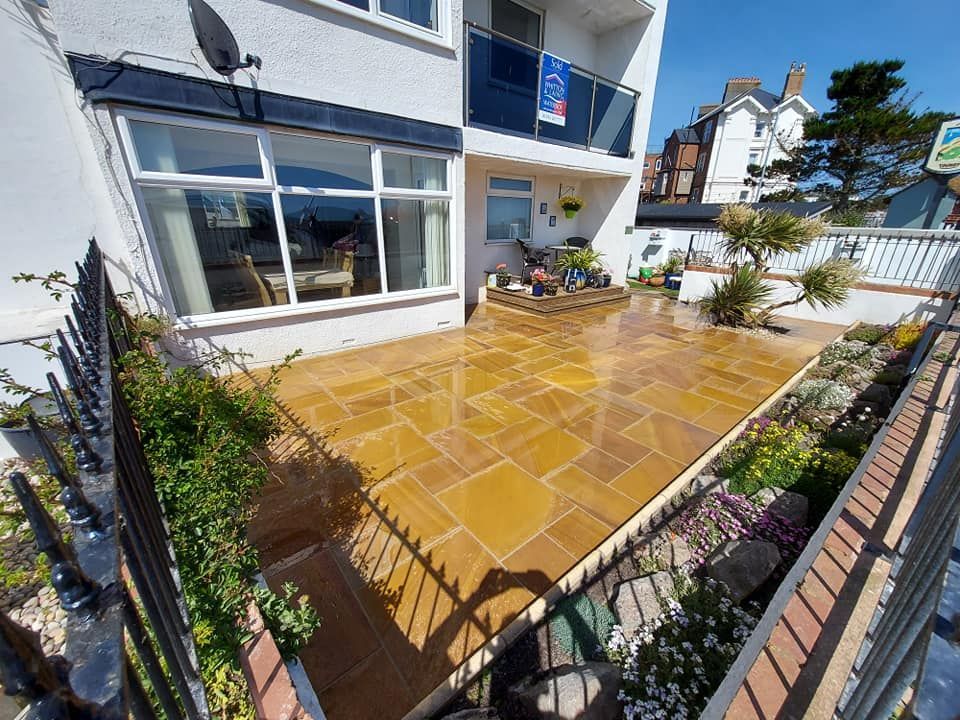 A newly installed indian sandstone patio.