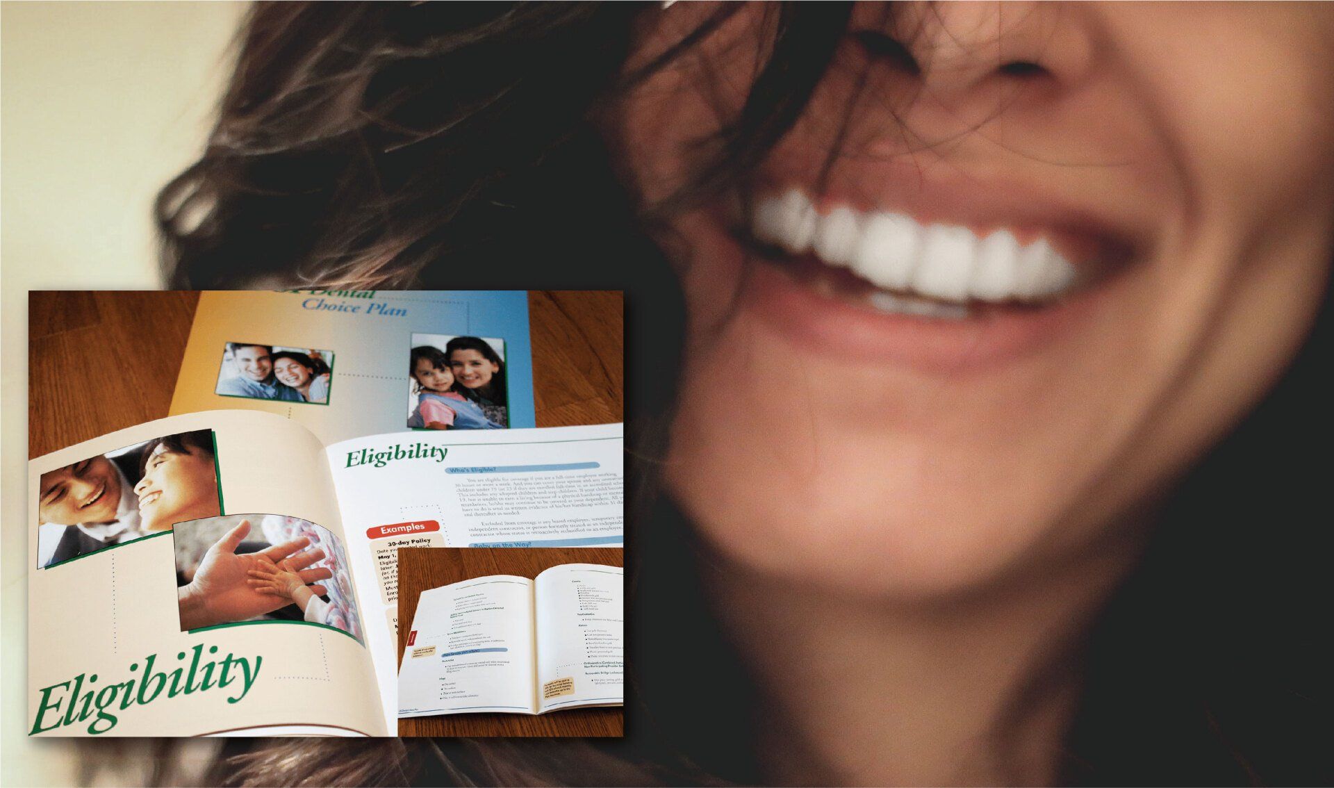 Woman smiling widely next to an open brochure showing images and text about eligibility.
