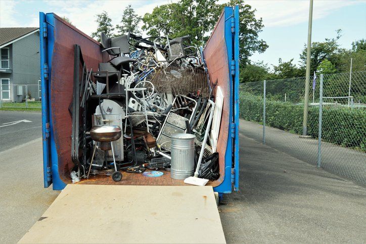 Metal waste collected in a container in a community disposal place