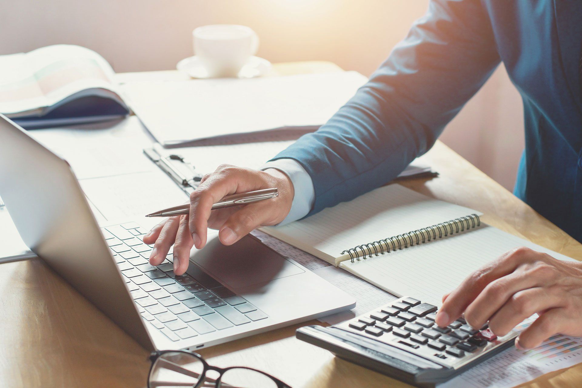 Small business accountant working on a laptop.