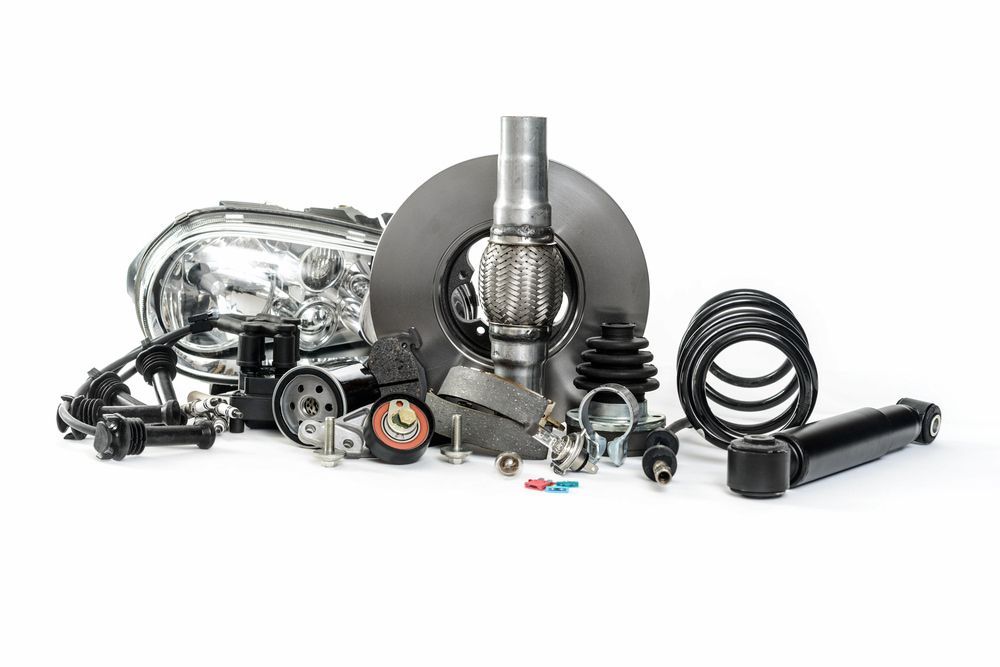 Assorted Car Parts, Including a Headlight, Brake Rotor, and Springs — Crypto Parts In Tuggerah, NSW