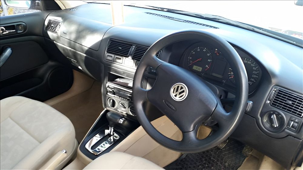 Interior View of a Black and Beige Volkswagen Car Dashboard — Crypto Parts In Tuggerah, NSW