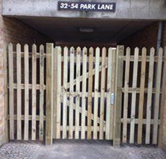 wooden fencing gates for a park lane