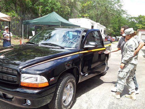 Black Car — Inverness, FL — MacDonald Top Line Specialties