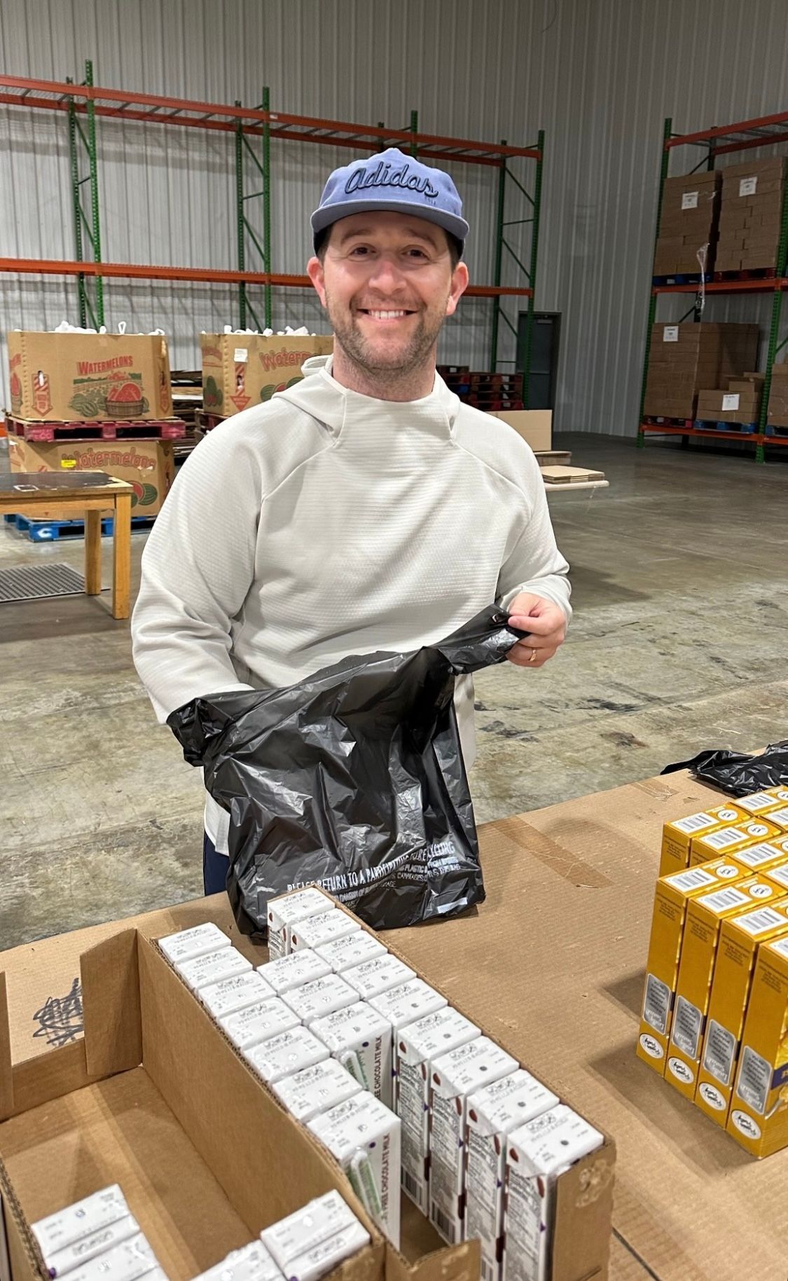David Talley packing food supplies at Second Harvest Food Bank of Northeast TN in Kingsport
