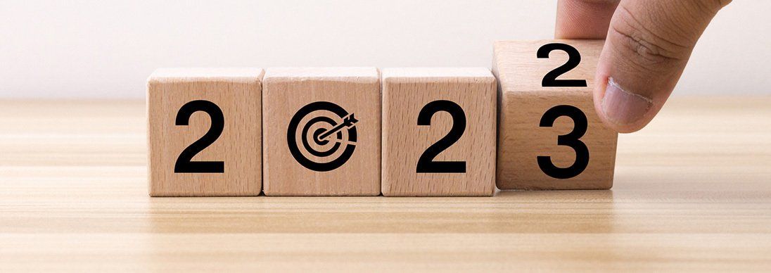 Four wooden blocks spelling out 2023