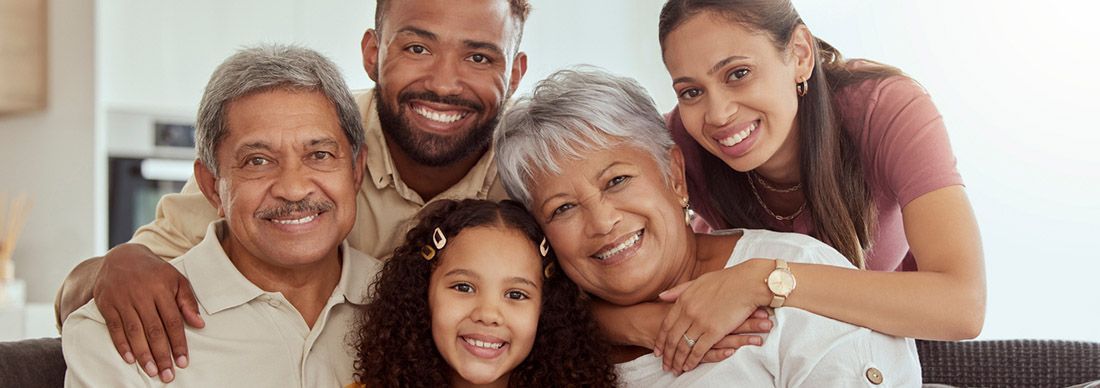 A multigenerational family representing a family trust - four adults and one young girl