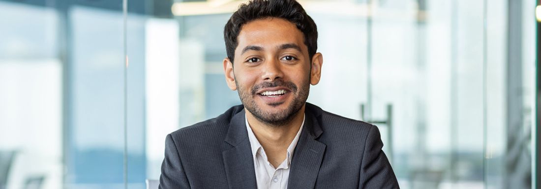 Two business woman looking at a computer