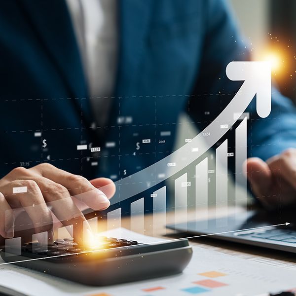 Business man with calculator and graph