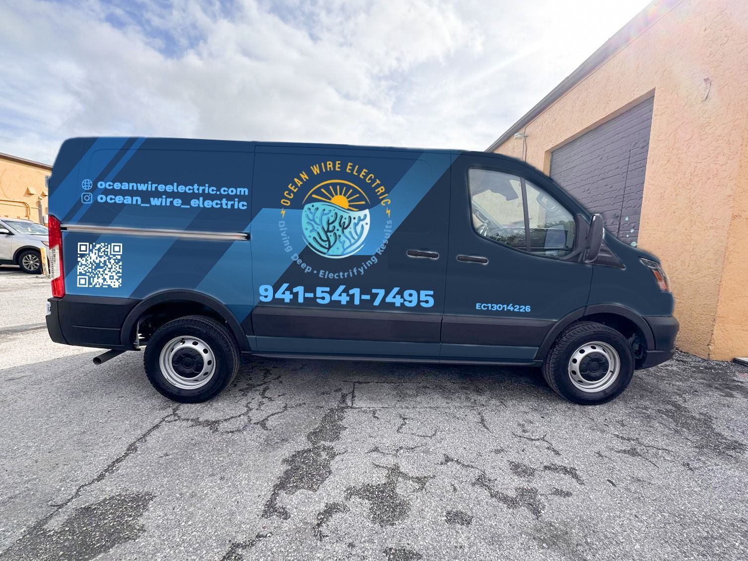 Ocean Wire Electric company van with contact details, providing trusted electrical services and emergency repairs.