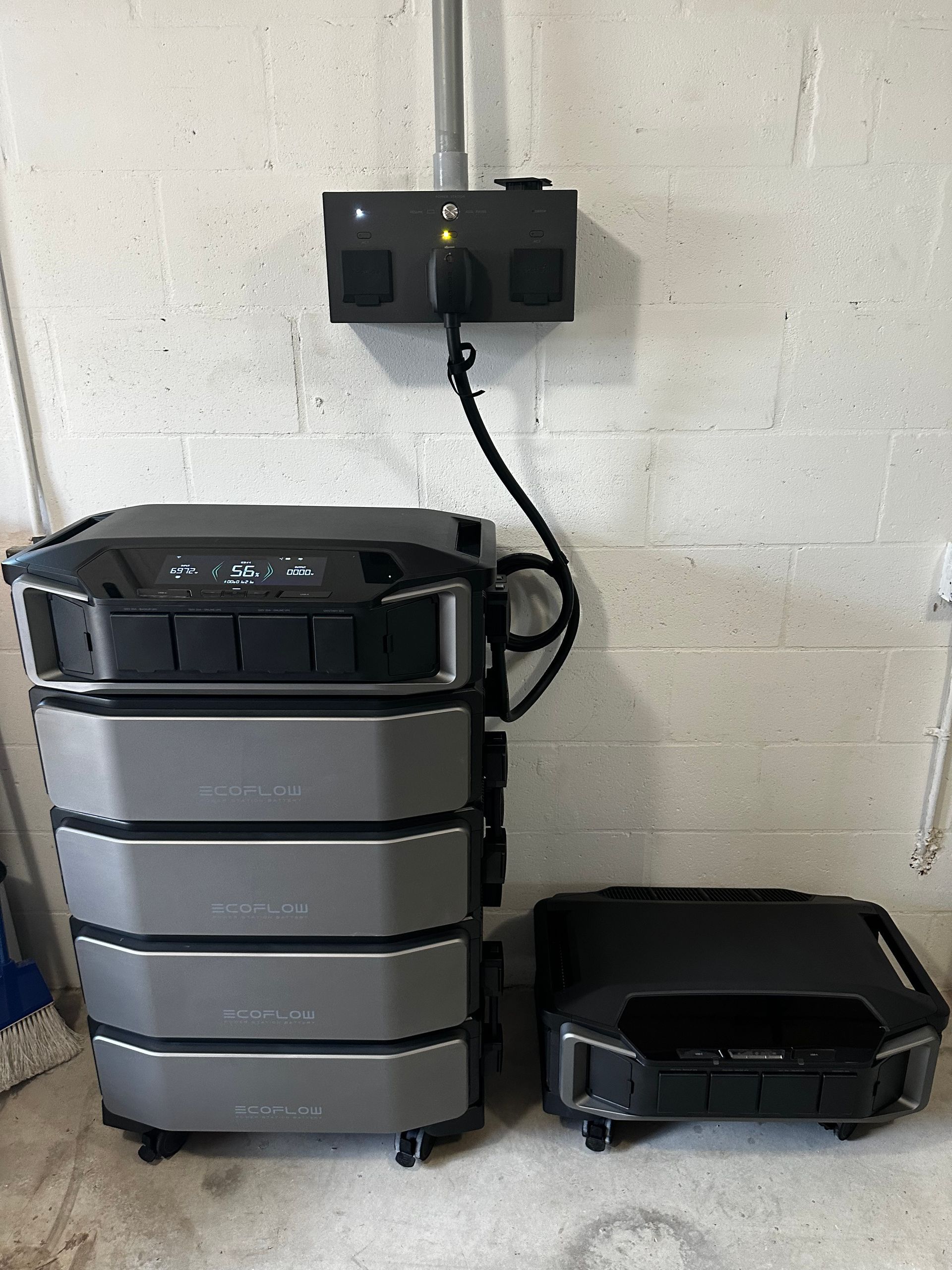 EcoFlow power system installation with electrical outlet setup for reliable home backup energy storage.