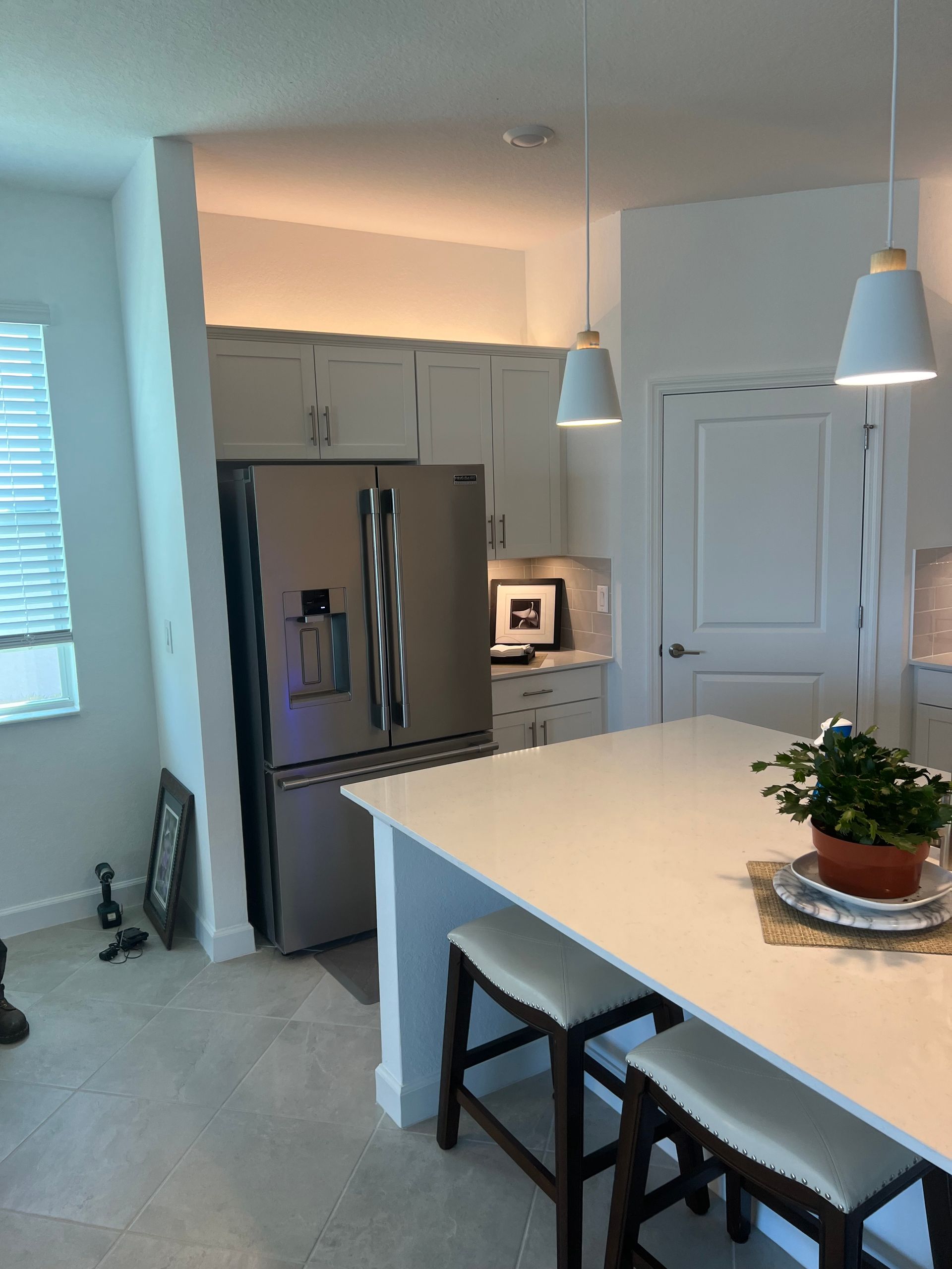 Professional kitchen pendant light installation for enhanced lighting and energy-efficient electrical solutions.