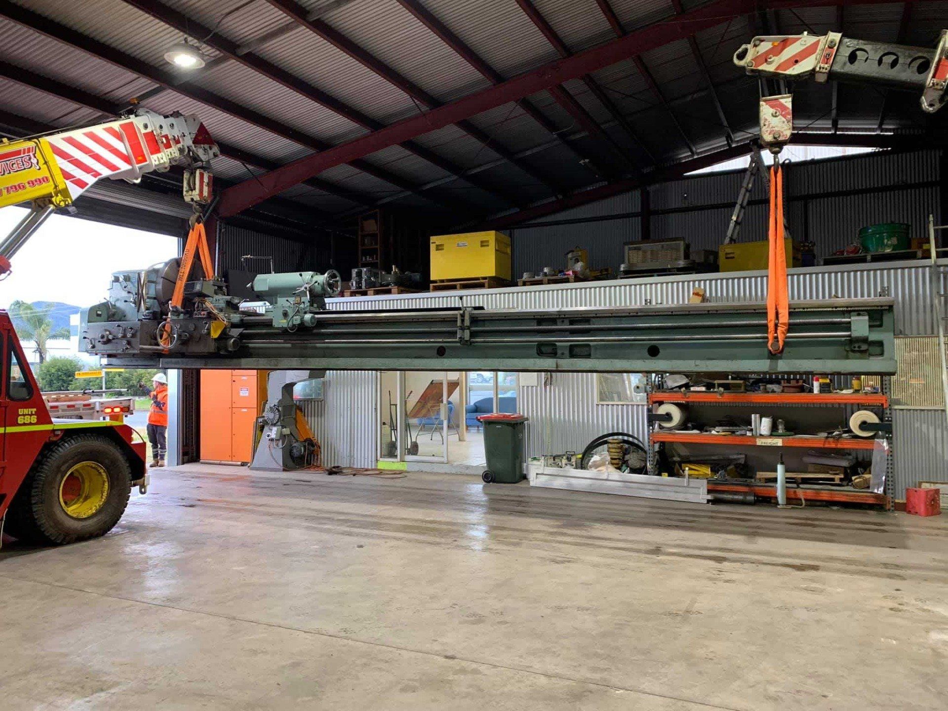 Lifting Heavy Machine Inside The Facility — Engineering in Tamworth, NSW