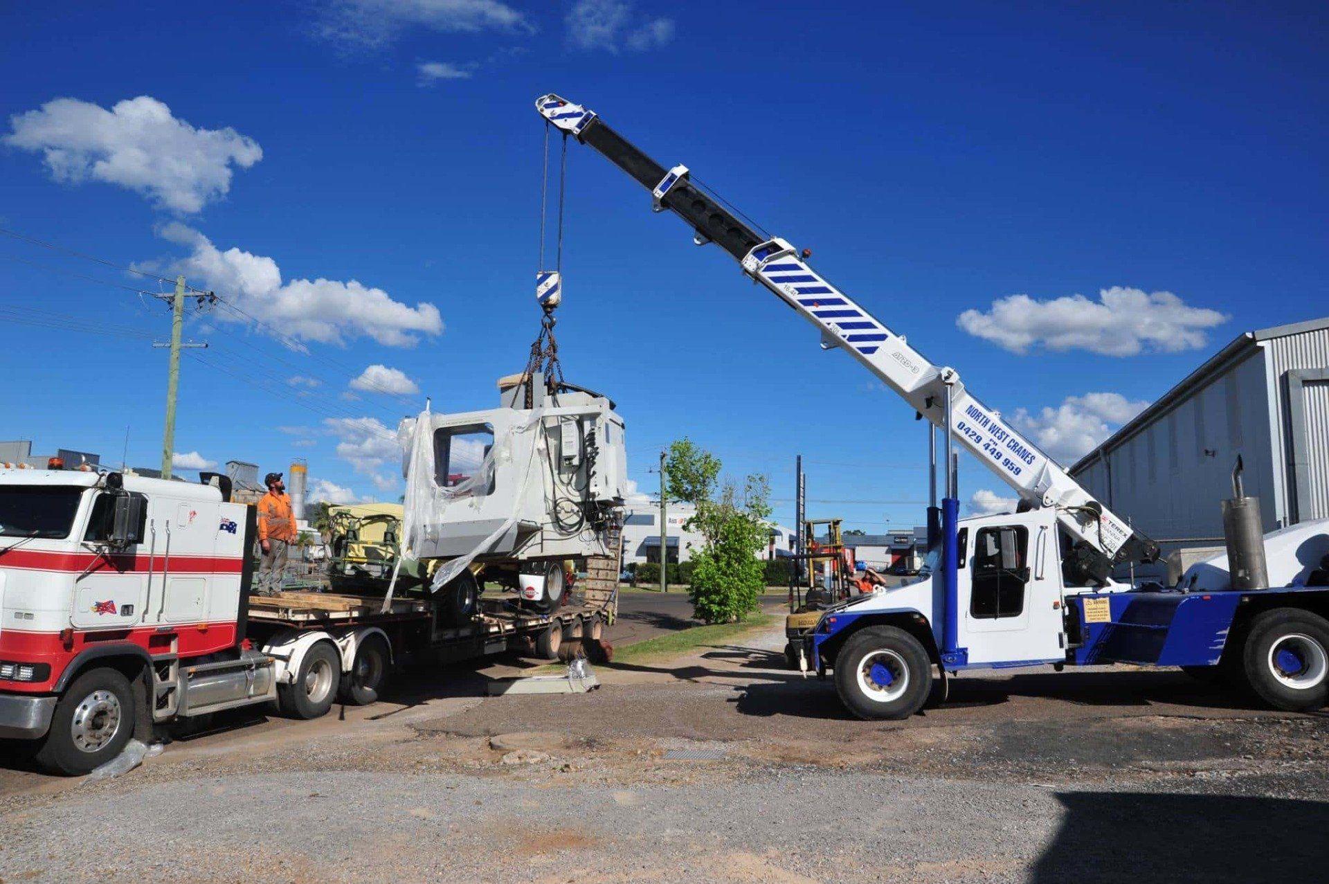 Crane Lifting The Heavy Equipment — Heavy Machinery Repairs in Tamworth, NSW