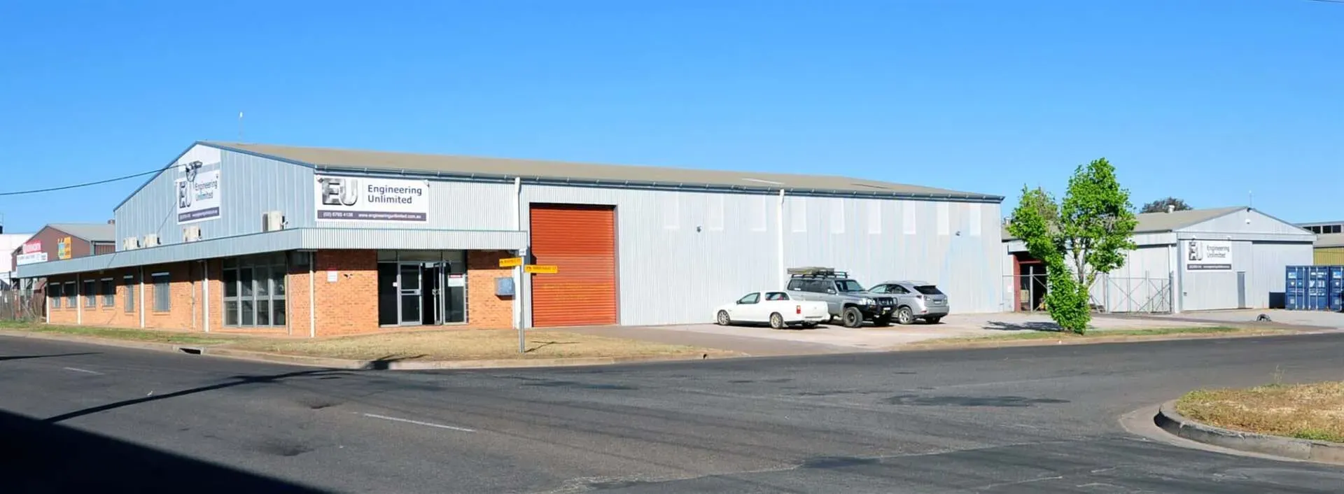 Trucks Parked In Front Of Warehouse — Engineering in Tamworth, NSW