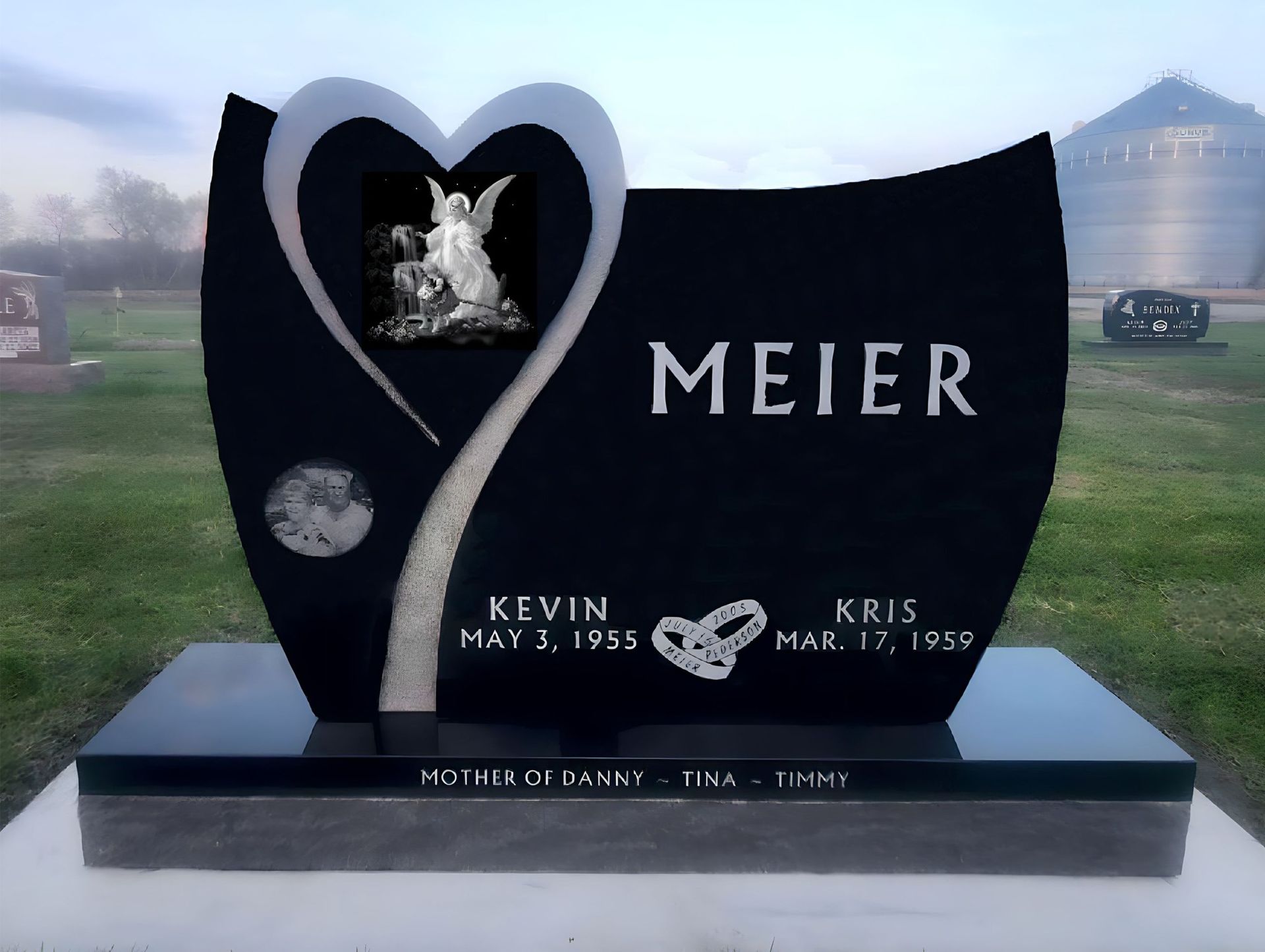 Black granite tombstone with 