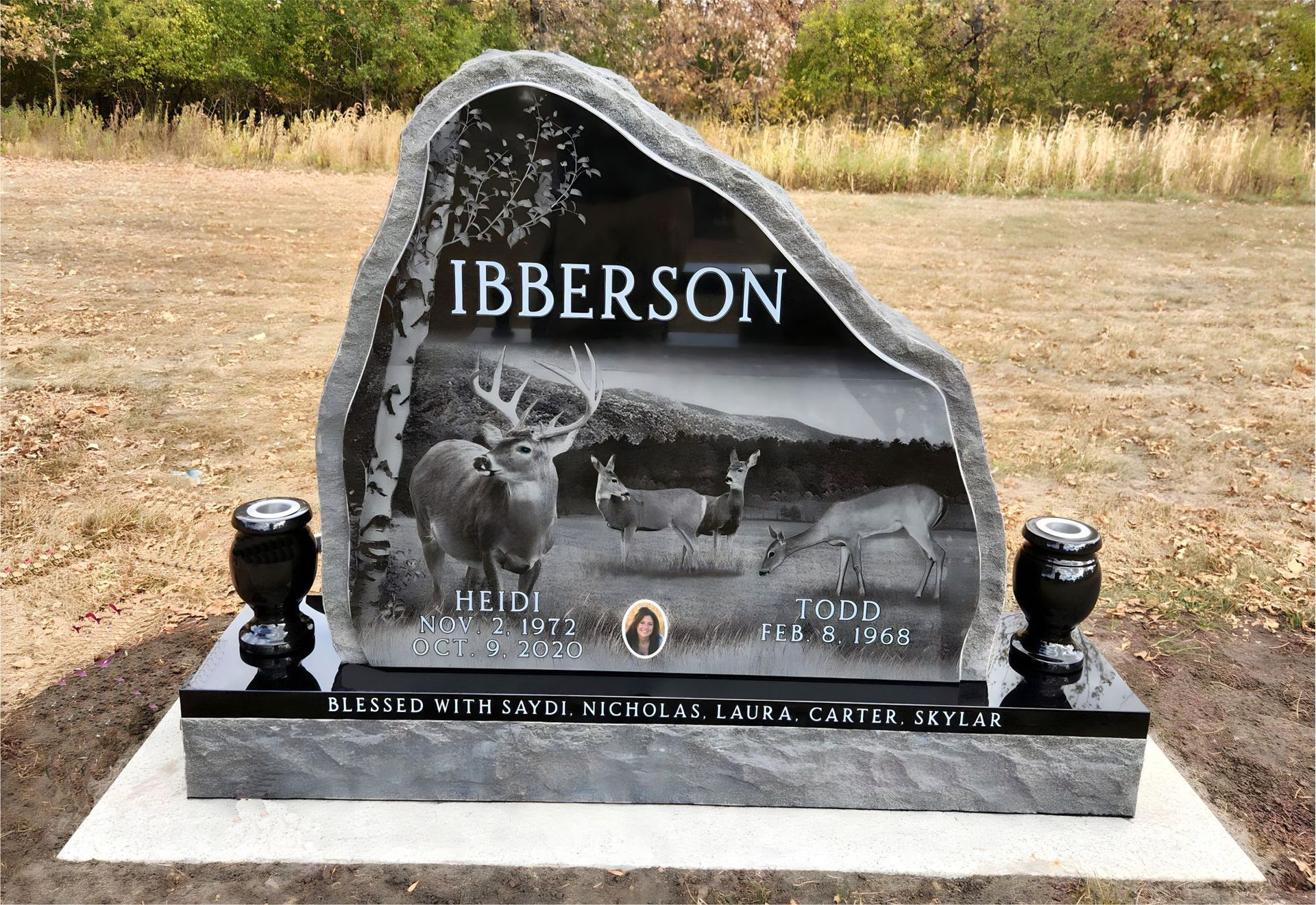 Gray stone tombstone with family name 