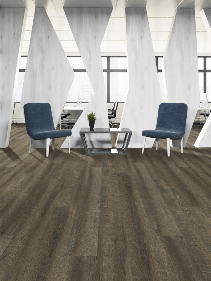 There are two chairs and a table in the room.