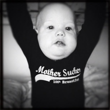 Baby in a top that says Mothersucker