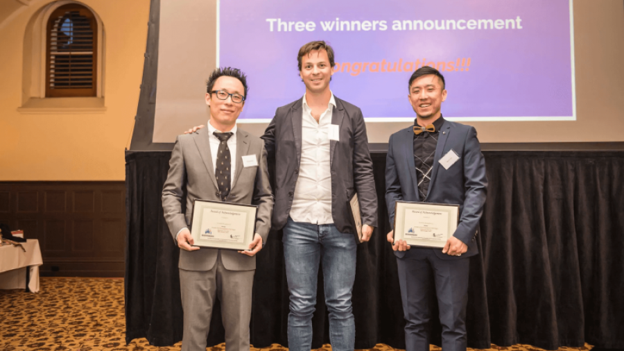 Speak Better English students receiving Advanced English Award Certificate