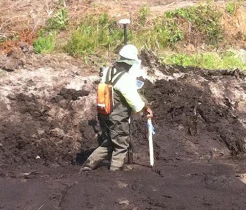 Worker Doing Topography Survey | Aiken, SC | Tripp Land Surveying, Inc.