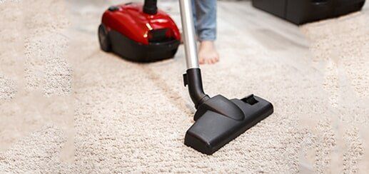 Maid Cleaning Carpet — Vacuum Center in Seattle, WA
