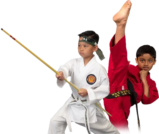 Two young boys are practicing martial arts with a stick