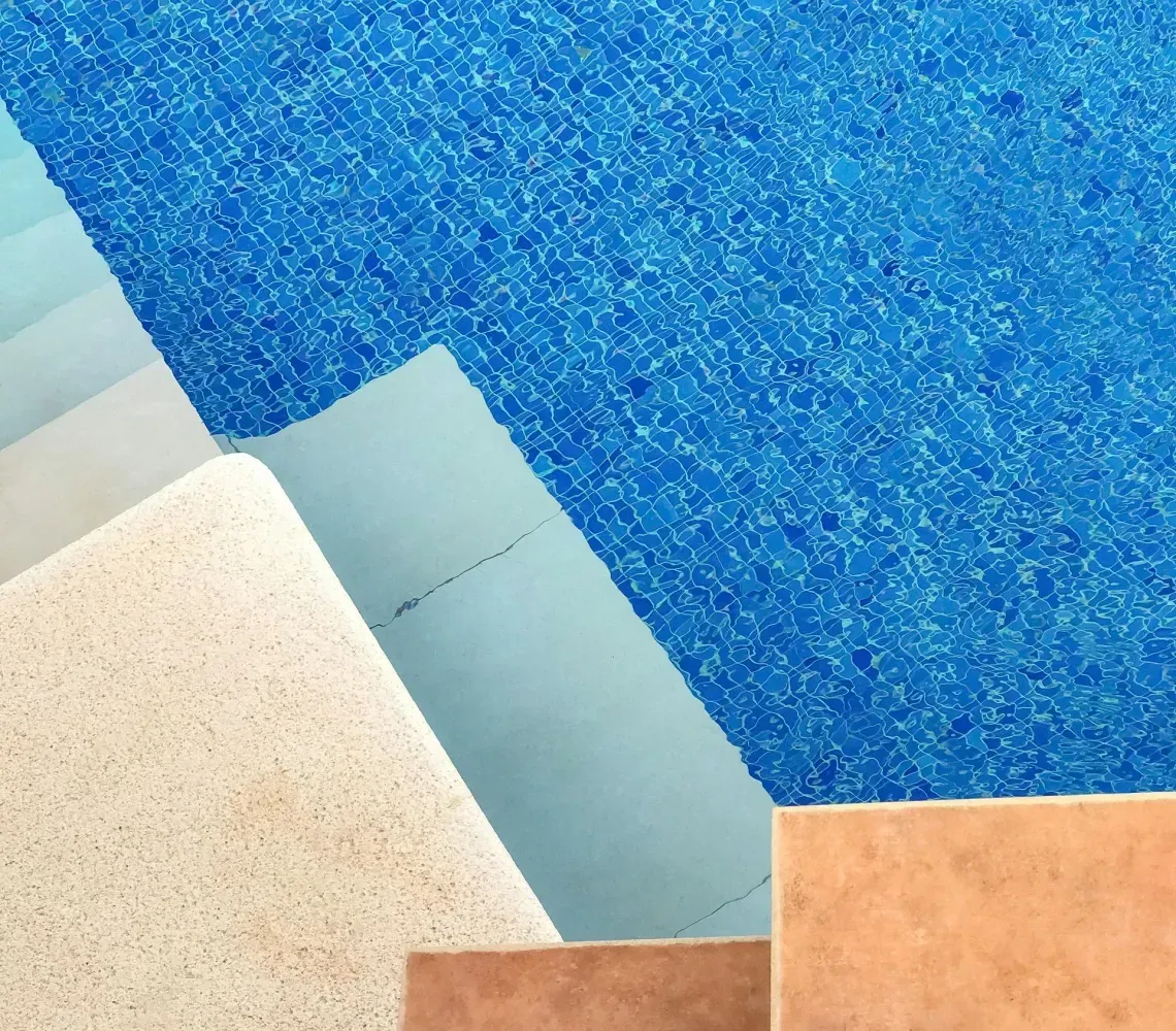 Blue and beige carpet sample squares arranged in a stepped pattern