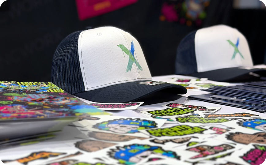 Two skateboards with colorful skull and graffiti art on a brown surface.