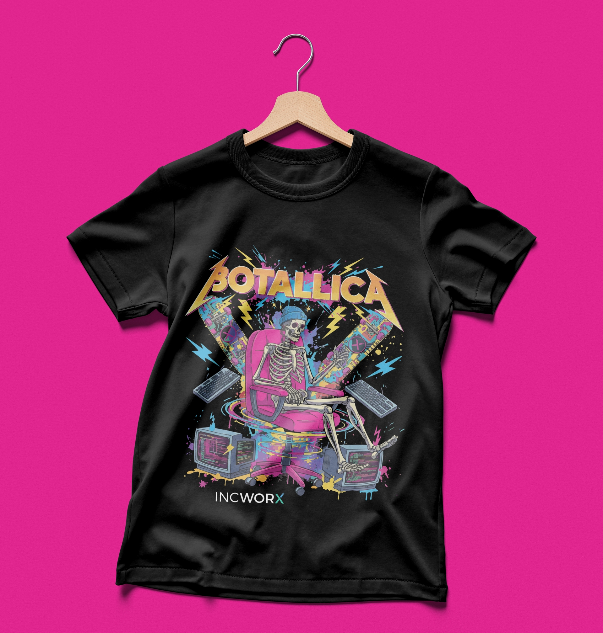 Black BOTALLICA t-shirt with skeleton playing drums surrounded by colorful paint splatters and boomboxes, hanging on a pink background.