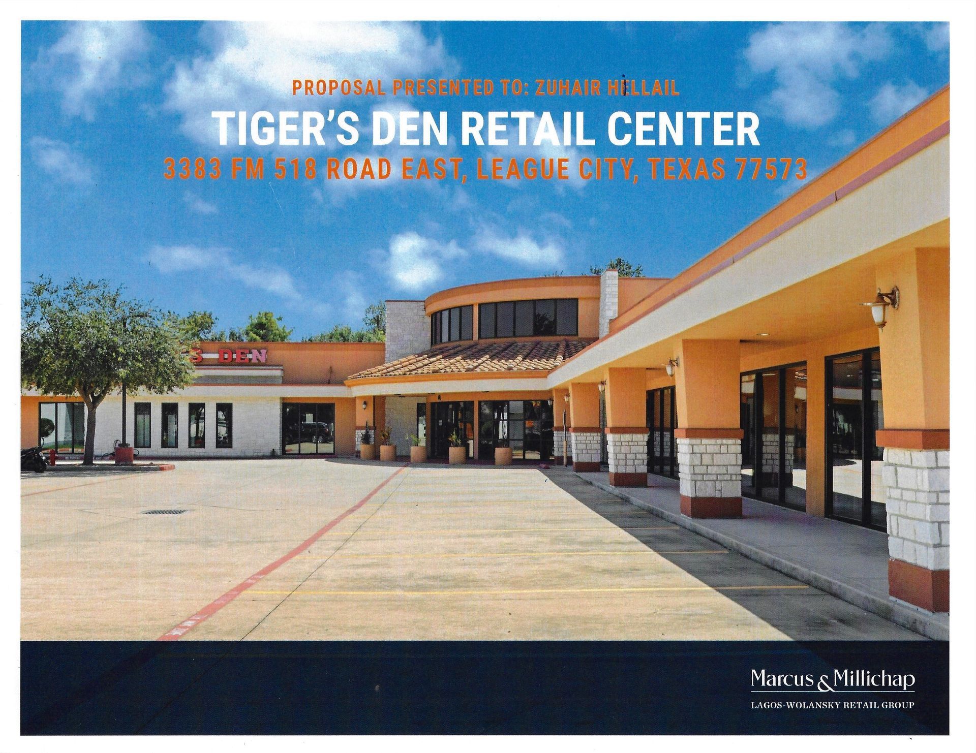 Tiger's Den Retail Center in League City, Texas. A commercial building with an orange and white exterior under a blue sky.