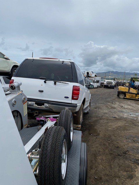 Towed Junk Car - Maui Auto Recycling in Puunene, HI