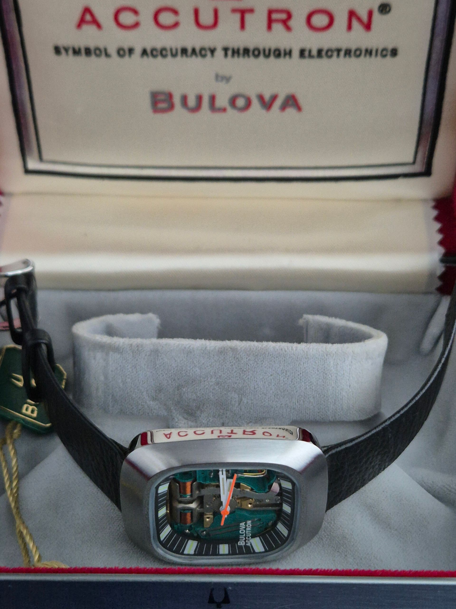 Vintage Bulova Accutron watch in its original box, with the watch visible.