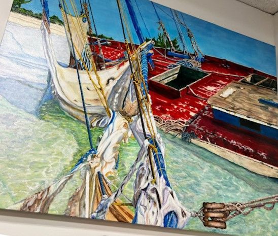 A painting of boats in a body of water