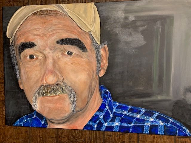 A painting of a man with a mustache wearing a hat and a plaid shirt.