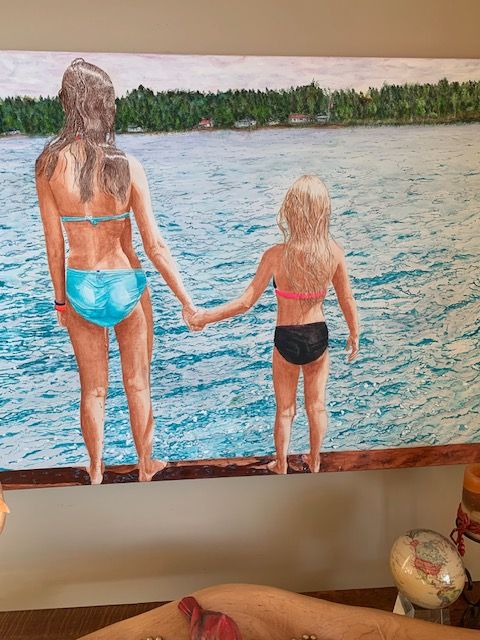 A painting of a mother and daughter holding hands in the water.