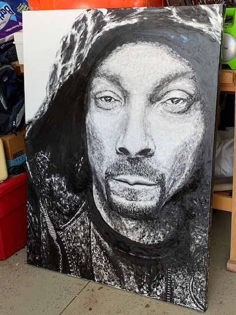 A black and white painting of snoop dogg
