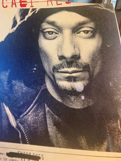 A black and white photo of snoop dogg